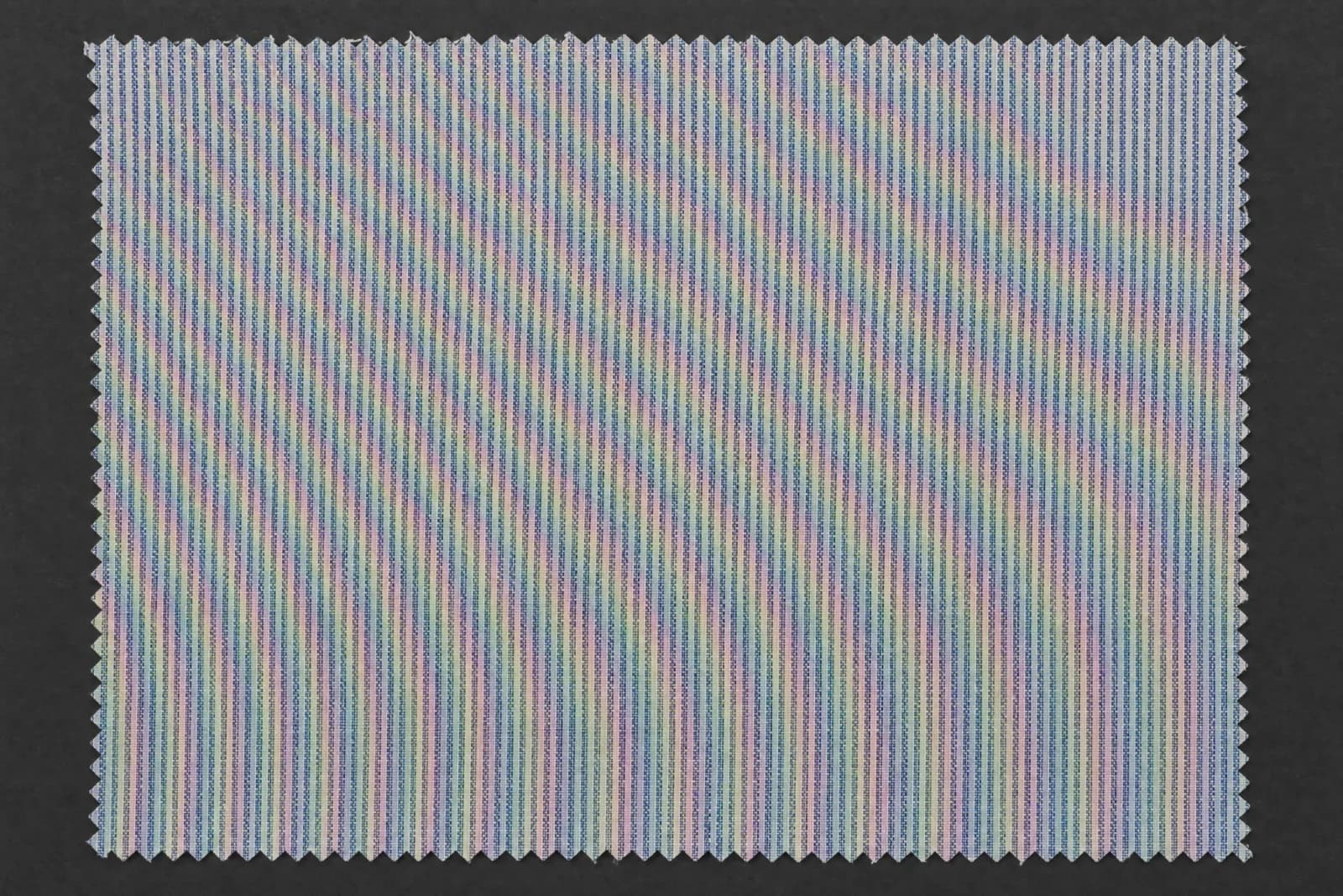 Fine striped shirting carrying rainbow interference bands across the whole surface.