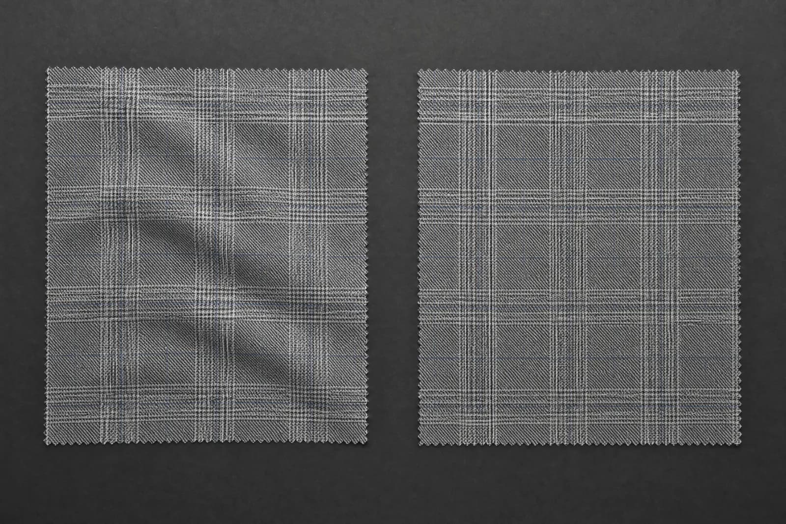 Grey glen check wool, photographed flat and close enough to separate the weave.